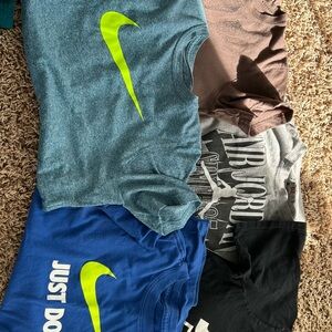 Nike T-Shirts with Swoosh and Air Designs